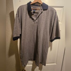 Izod Navy and White Patterned Polo Shirt, Perfect For Golf Or Casual Outing